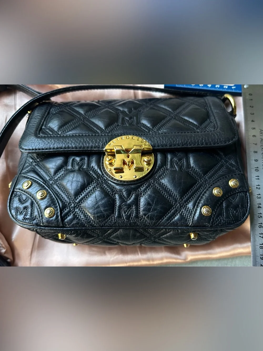Metrocity Black Quilted Leather Crossbody Bag with Gold Hardware